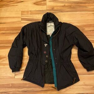 Vintage Obermeyer Women's Ski Jacket Size 8 with padded shoulders used blue